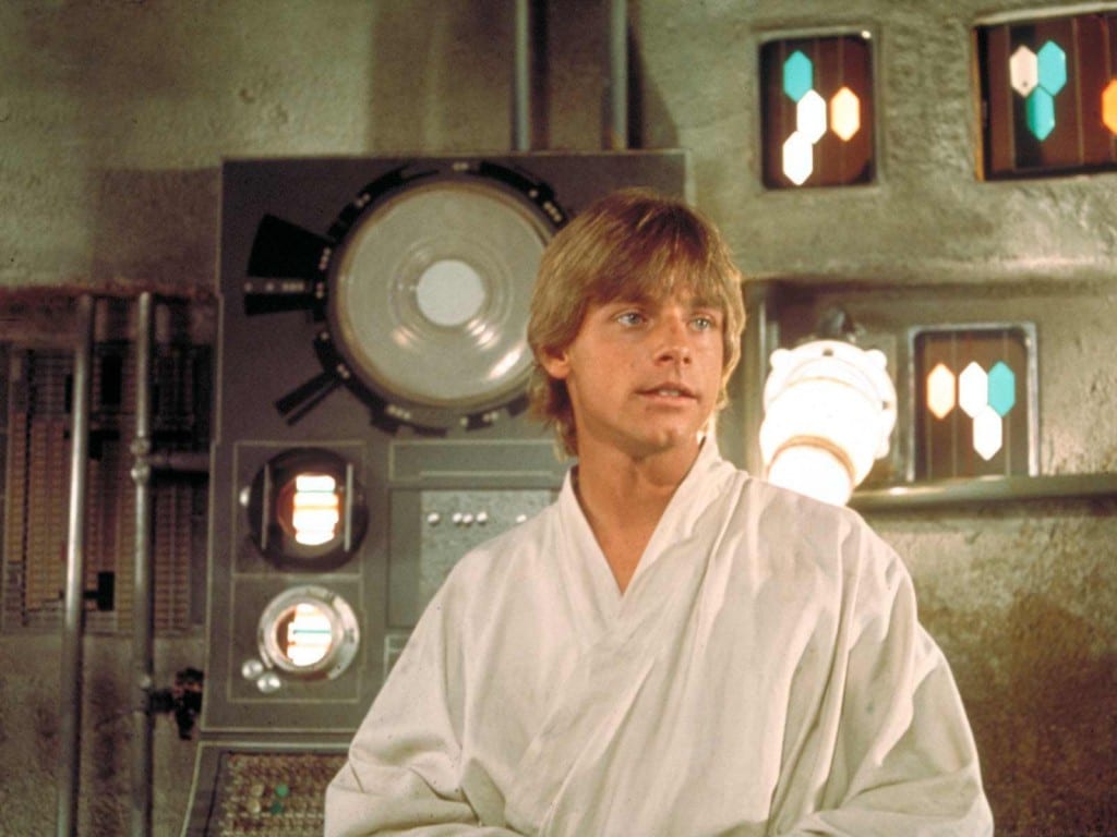 Luke Skywalker sitting in a room.
