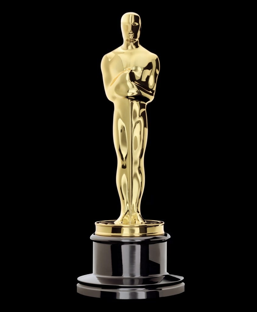 The Oscar Statuette, a gold man holding a sword set on top of a black base.