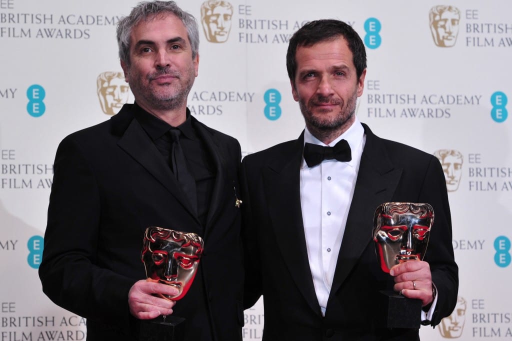 Alfonso and Jonas Cuaron, director and writer for the blockbuster film, Gravity are pictured with 2 of their BAFTA awards.