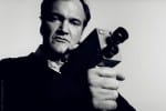 Quentin Tarantino holding a camera