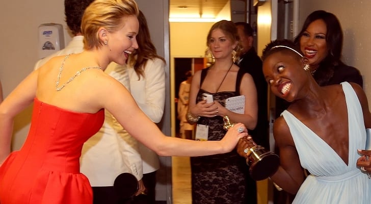 Pictures is the actress Jennifer Lawrence attempting to steal the Oscar for Best Actress from the winner, Lupita N'yongo