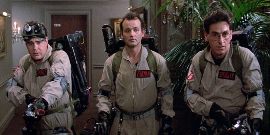 The image shows Billy Murray, Harold Ramis and Dan Aykroyd with their roles in the film, Ghostbusters.