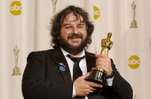 Peter Jackson holding an Oscar statuette at the Academy Awards