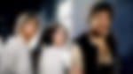 Image shows actors, harrison ford, carrie fisher and mark hamill on the set of star wars. The image is blurred.