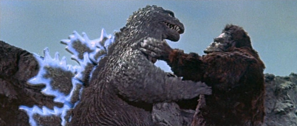 Image shows the movie monster Godzilla fighting famous ape, King Kong