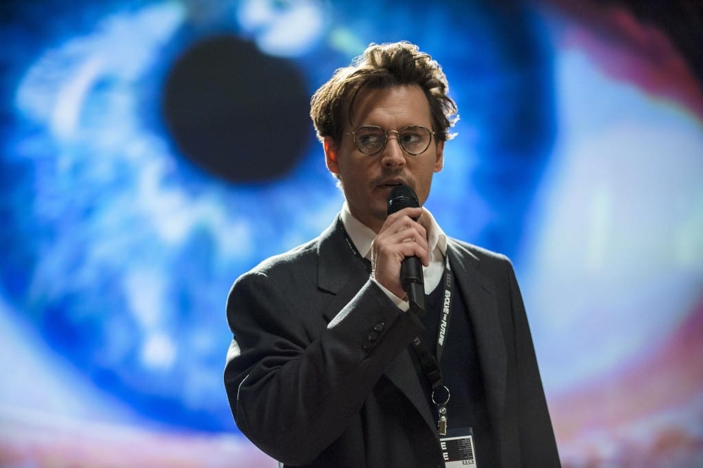 Johnny Depp holding a microphone in a still from the film, 'Transcendence'.
