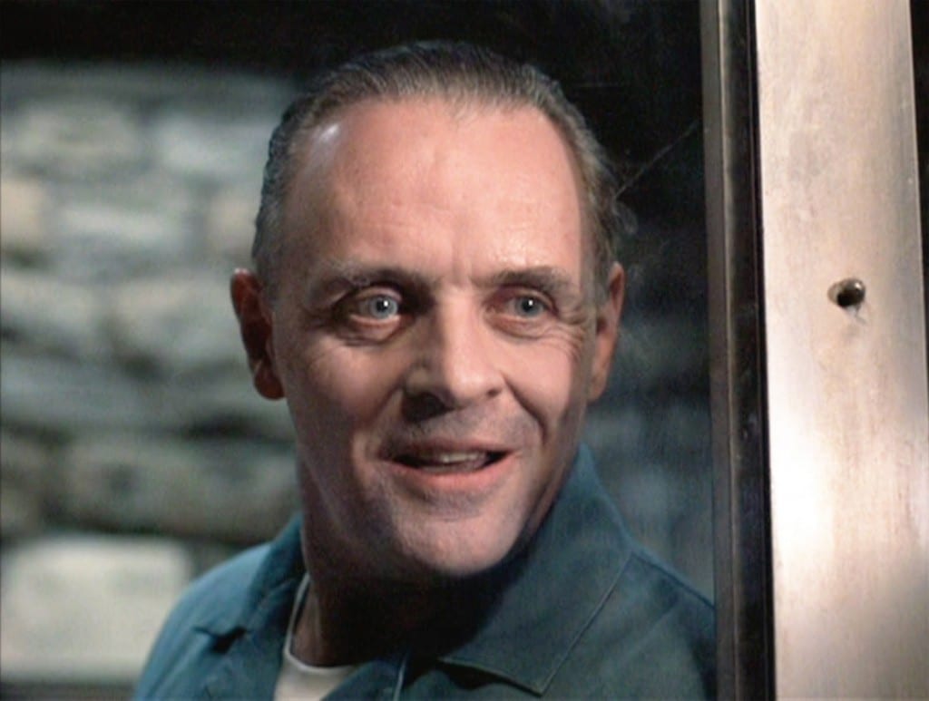 Hannibal Lecter, played by Anthony Hopkins, stood by a door.