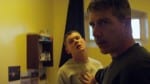 Jack O'Connell and Ben Mendelsohn in a prison cell.